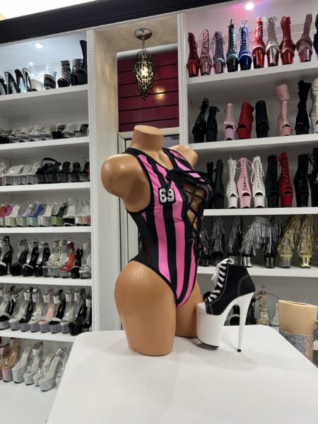 Pink referee stripe bodysuit with black vertical stripes and front tie