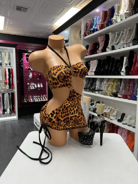 Leopard print halter cutout mini dress with ruched skirt