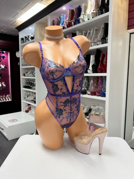 Purple lace bodysuit lingerie with sheer embroidery and front cutout design