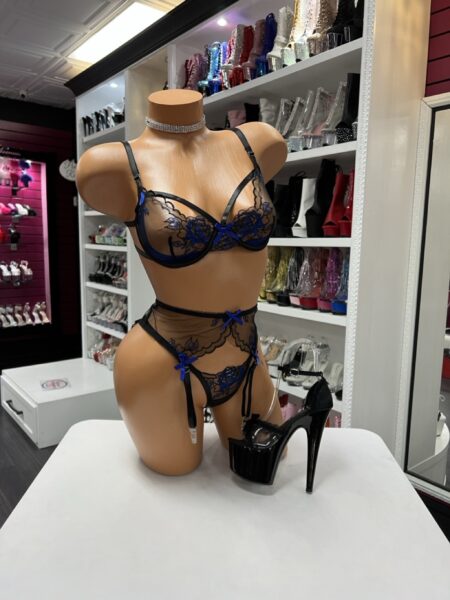 Midnight blue garter lingerie with sheer mesh bra, thong, and adjustable garter straps