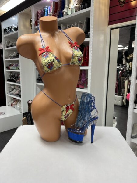 Retro Pop Graphic Bikini features a colorful print, adjustable ties, and a micro fit for a bold and playful look.