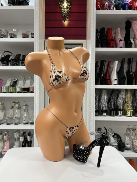Tan leopard micro bikini with bold animal print and minimal string design. Lightweight, adjustable, and perfect for standout styling.