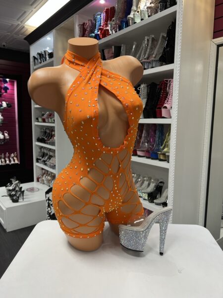 This orange rhinestone halter romper features a bold cutout design with sparkling detail. Stretchy and form-fitting, it’s perfect for standout looks.