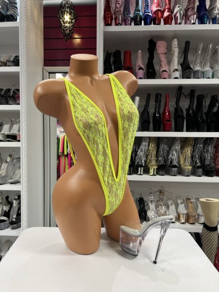 neon yellow slingshot bodysuit deep plunge halter high cut sheer sparkle stretch fitted bold design