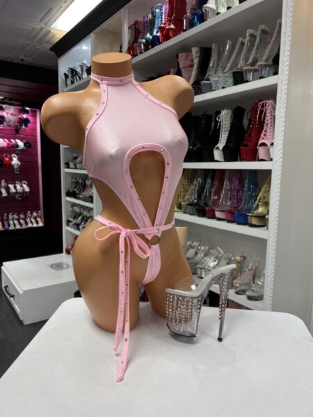 Pink cutout halter bodysuit with rhinestone detail and adjustable tie