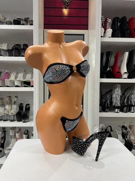 Black rhinestone bikini with bandeau top, center ring detail, and micro bottom with thin clear side straps sparkling finish