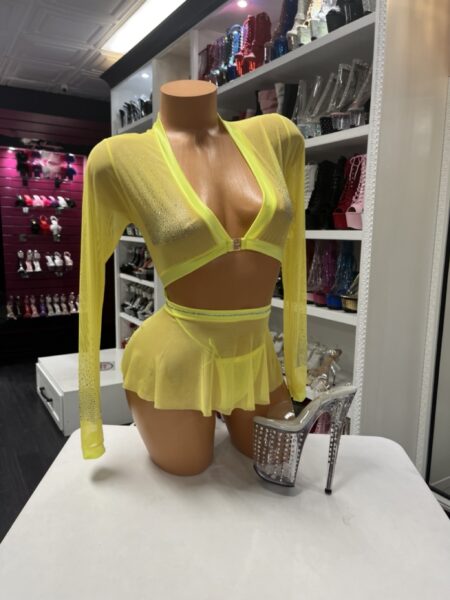 Neon yellow mesh two piece set with long sleeve top, thong, and removable skirt