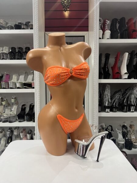 Neon orange rhinestone bikini with bandeau top and minimal thong bottom with sparkling detail