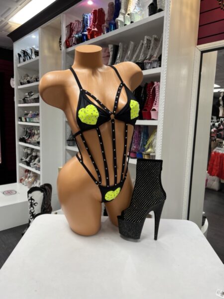Black neon cage bodysuit with rhinestone details and strappy cutout design