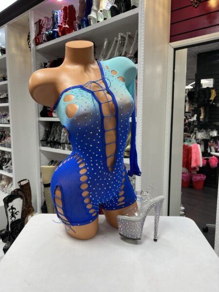 Blue ombre one sleeve romper with rhinestone details, lace-up front, side cutouts, and open back design.
