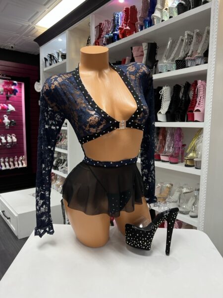 Midnight navy lace skirt set with sheer floral lace, rhinestone trim, mesh mini skirt, and strappy thong detail.