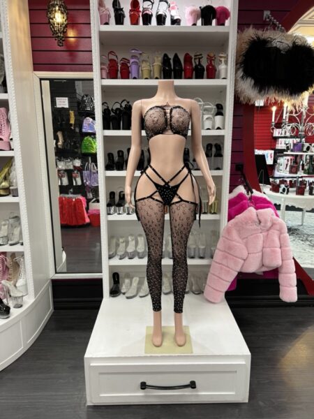 Black strappy lace set with crop top and sheer cutout leggings
