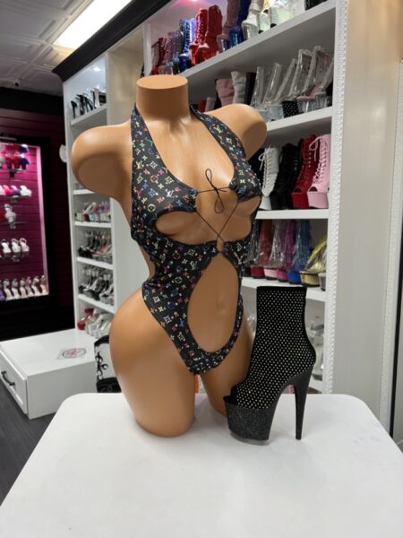 black monogram cutout bodysuit with halter neckline and bold front cutouts