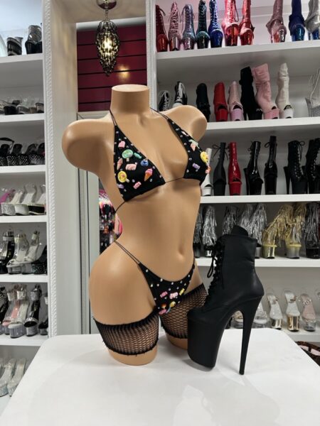 Candy charm bikini set with black triangle top, matching thong, colorful candy-inspired accents, and small sparkle details.