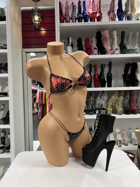 Flame rhinestone micro bikini with red orange black print, triangle top, string bottom, and sparkling accents on mannequin.