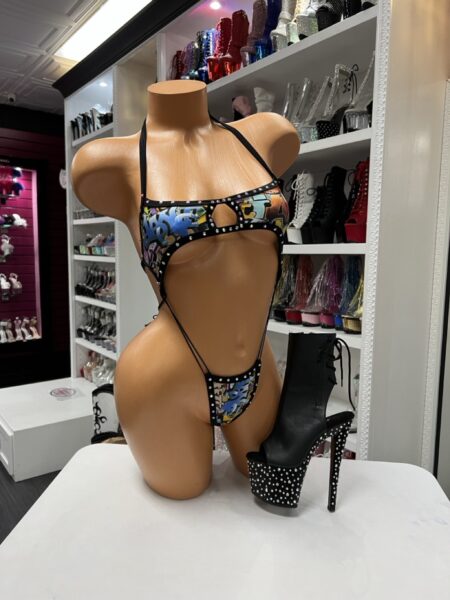 Urban Rebel Monokini with graffiti print, rhinestone trim, dramatic cutouts, and thong back design