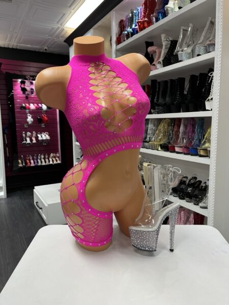 Fuchsia One Leg Romper with floral lace, crystal embellishments, lace-up front, and attached fishnet asymmetrical leg detail.