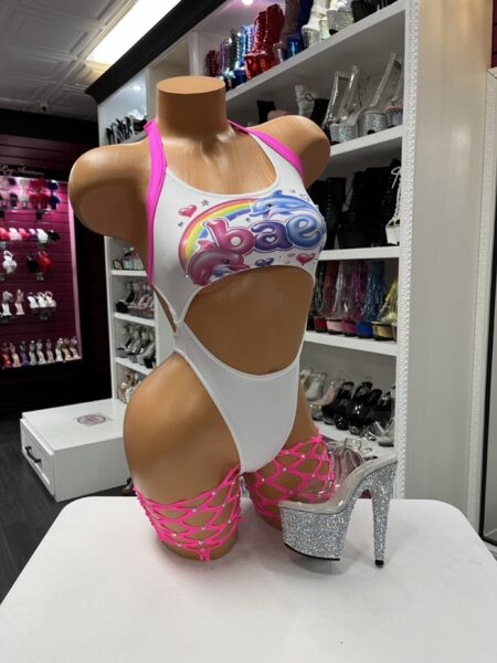 Bae Dolphin Garter Romper with colorful dolphin graphic, rainbow accents, hot pink trim, and matching fishnet thigh garters.