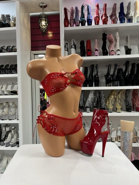 Ruby Crystal Fishnet Bikini with sparkling crystal embellishments, lace-up bandeau top, fishnet shorts, and adjustable side ties.
