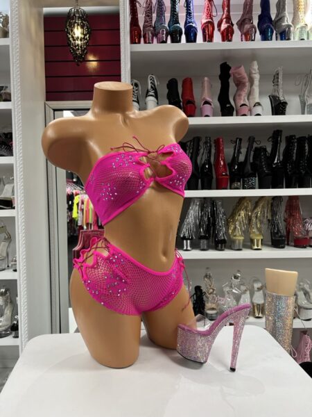 Hot Pink Crystal Fishnet Bikini with crystal embellishments, fishnet overlay panels, lace-up details, and matching bottoms.