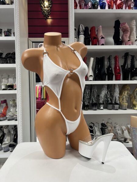White Ring Cutout Romper with halter neckline, silver ring accents, and dramatic front cutout design.