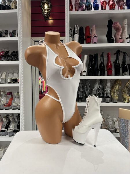 Turn heads in this sleek white monokini featuring dramatic side cutouts, a unique front keyhole design, and a high-cut silhouette. Perfect for beach vacations, festivals, poolside parties, and statement styling.