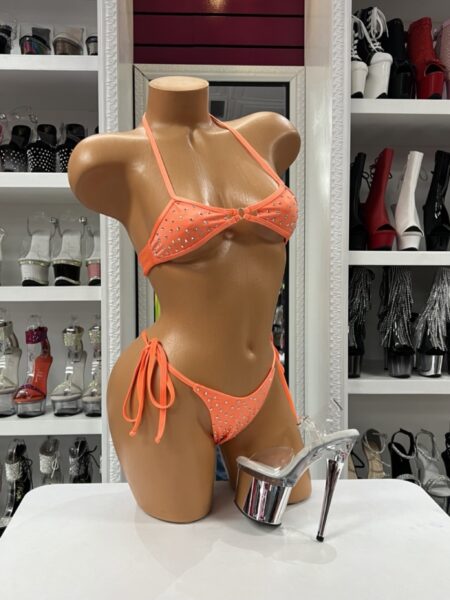Orange Rhinestone Bikini with sparkling rhinestones, halter top, adjustable side-tie bottoms, and decorative center ring.