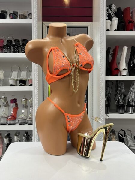 Orange Rhinestone Bikini with crystal rhinestones, gold chain detail, metallic eyelets, and adjustable triangle top.