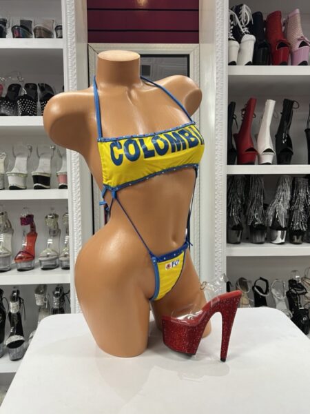 Colombian Pride Bikini Set featuring bright yellow fabric, blue trim, bandeau halter top, matching thong bottom, and Colombia-inspired graphics.
