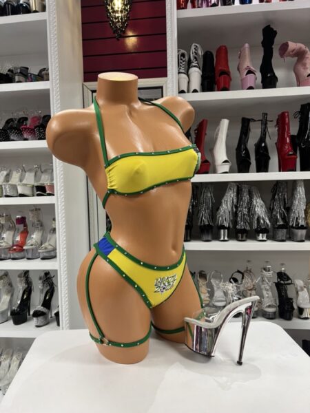Brazil Garter Bikini featuring a bandeau top, matching bottoms, adjustable leg garters, rhinestone trim, and Brazil-inspired colors.