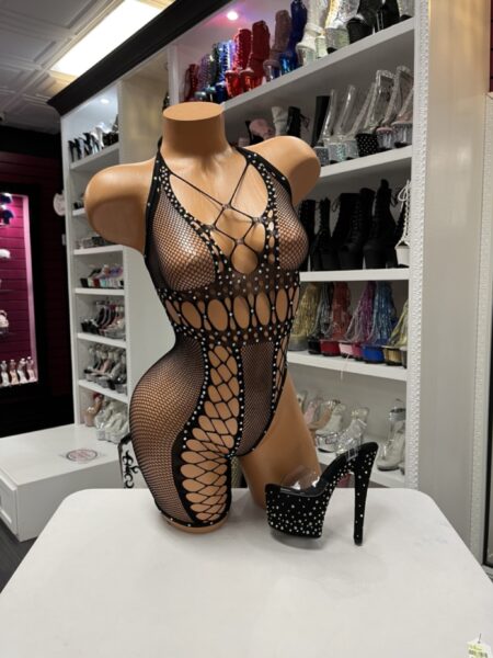 Black Fishnet Romper with rhinestone embellishments, halter neckline, geometric fishnet pattern, and body-contouring design.