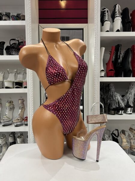 Burgundy Rhinestone Monokini featuring sparkling rhinestones, a plunging triangle halter neckline, dramatic side cutouts, adjustable tie closures, an open-back design, soft stretch fabric, and a rich burgundy finish.