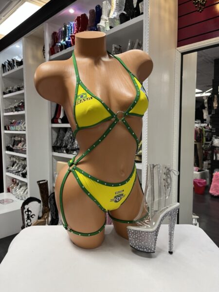 Green Yellow Romper Garter Set featuring rhinestone trim, attached garter straps, dramatic cutouts, and vibrant green and yellow styling.