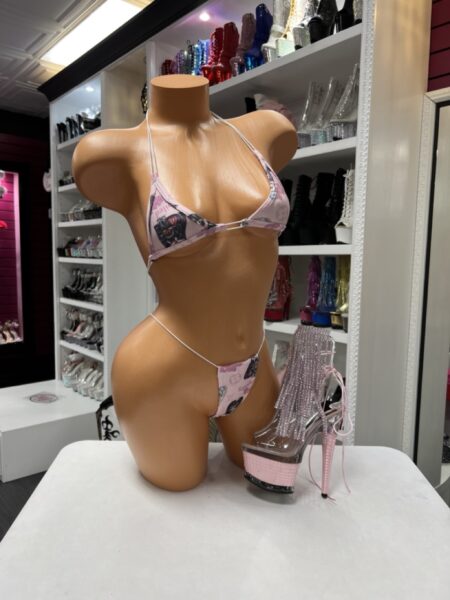 Pink Graphic Micro Bikini featuring an illustrated graphic print, adjustable string ties, soft stretch fabric, micro triangle top, and matching minimal bottoms.