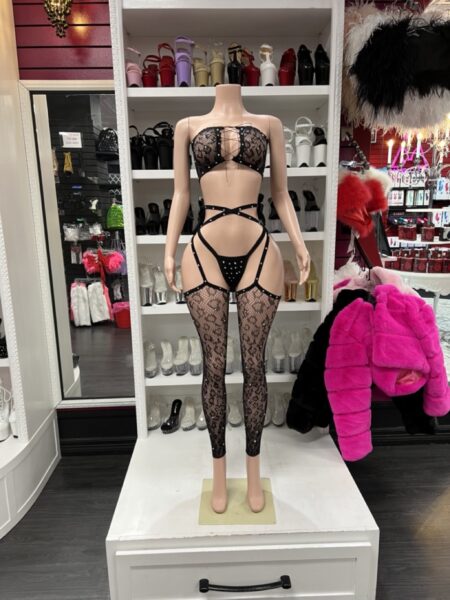 Black Lace Garter Set with a lace-up bandeau top, matching high-cut thong, attached floral lace garter leggings, and decorative strappy waist details.