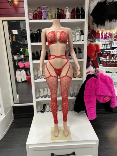 Red Lace Garter Set with a lace-up bandeau top, matching high-cut thong, attached floral lace garter leggings, and decorative strappy waist details.