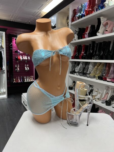 Aqua Fishnet Wrap Set with a fishnet bandeau top, matching wrap mini skirt, adjustable rhinestone drawstring ties, and lightweight stretch fabric.