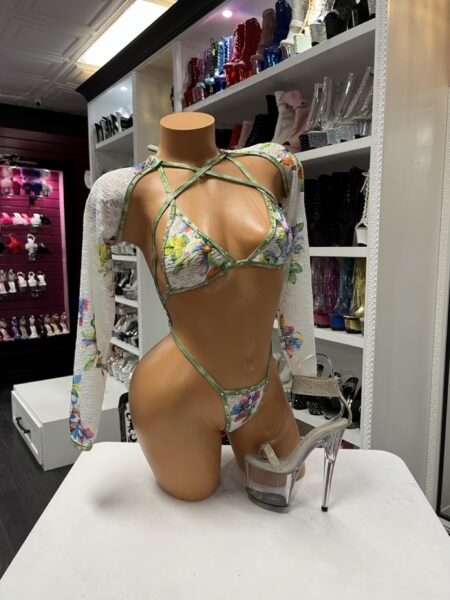 Garden Floral Sling Set featuring a triangle halter top, attached floral mesh sleeve sling bottom, sage green trim, and rhinestone accents.