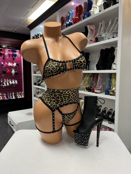 Leopard Garter Bikini Set with leopard print bikini top, thong, crystal trim, and matching garter belt with attached leg garters.