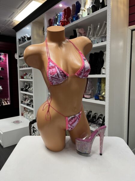 Pink money print bikini with sparkling rhinestone trim, adjustable triangle halter top, and matching tie-side thong for festival, vacation, and poolside style.