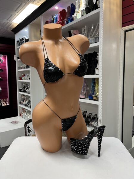 Black rhinestone bikini with adjustable triangle halter top, matching thong bottom, sparkling crystal trim, and a sleek minimalist design.