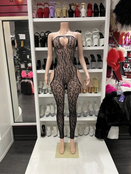 Black lace catsuit featuring rhinestone embellishments, sheer floral lace, halter neckline, keyhole front, and dramatic side cutout details.
