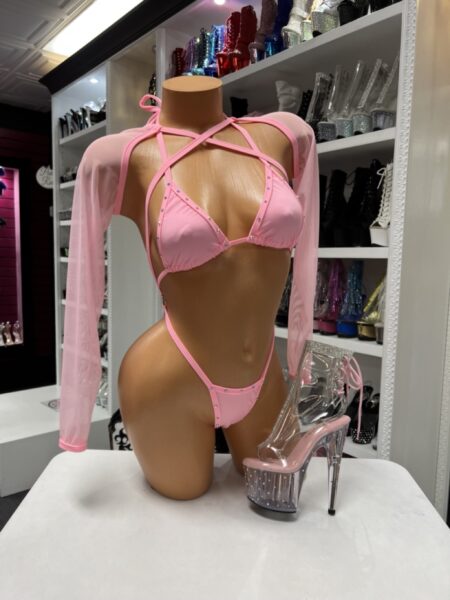 Pink sleeve slingshot with rhinestone-trimmed triangle bikini, sheer mesh sleeves, and wraparound straps.