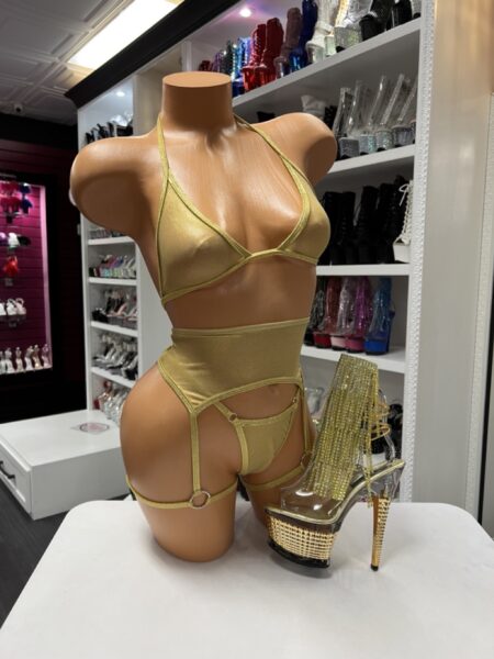 Gold mesh garter set featuring a triangle top, matching bottoms, and an adjustable garter harness.