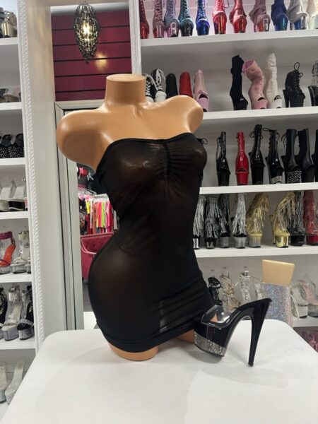 Black Mesh Mini Dress featuring sheer stretch mesh fabric, strapless neckline, ruched bust detail, and a bodycon mini silhouette.