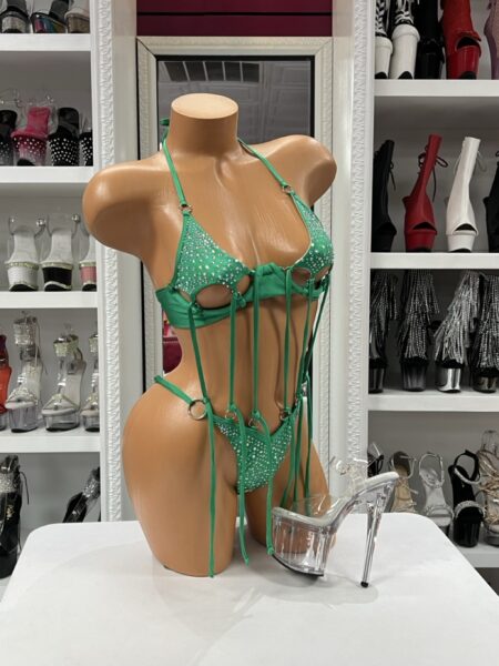Turn heads in the Emerald Crystal Tassel Bikini, a dazzling two-piece featuring sparkling crystal embellishments, dramatic hanging tassels, and adjustable halter styling. Perfect for festivals, beach vacations, pool parties, and performances.