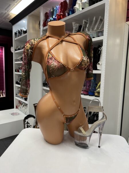 Floral Sleeve Slingshot Set featuring sheer mesh sleeves, floral print, rhinestone accents, dramatic cutouts, and an open-back design.
