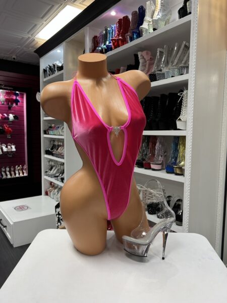 Hot Pink Velvet Monokini featuring a plunging neckline, crystal center accent, high-cut silhouette, and soft velvet fabric.
