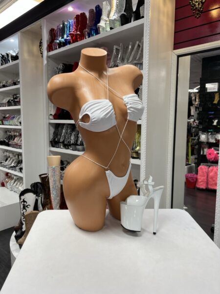 White Halo Monokini Set featuring a white cutout one-piece swimsuit with ruched cups, adjustable crisscross straps, and metal ring accents.