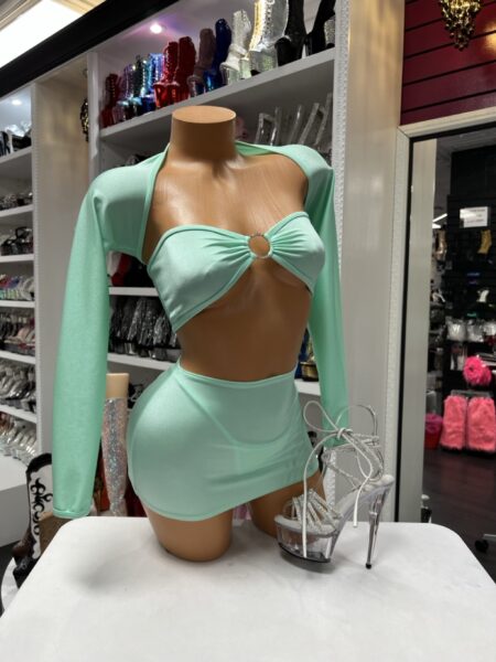Mint Shrug Skirt Set featuring a mint bandeau bikini top, matching thong bottoms, mini skirt, and long sleeve shrug with crystal ring detail.